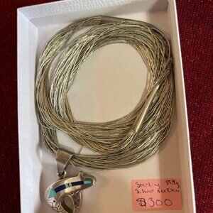 Native American-style liquid sterling silver necklace with a Zuni bear pendant